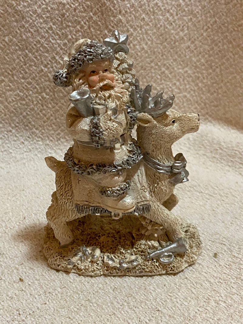 2000 Cornerstone Creations Santa Riding a Reindeer - White Figurine